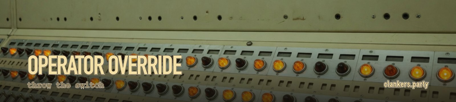 Operator override. Throw the switch. Enter the thread. Wide 1970s operator panel, row of toggle switches and amber lamps along the bottom, stencil title along the top.